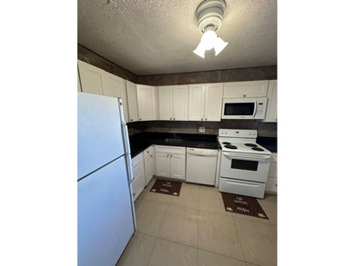 ELEGANT 3 BEDROOM 2 BATH; CONDO IN THE PALM AIRE COUNTRY CLUB on Palm-Aire Country Club and Resort - Palms in Florida - for sale on GolfHomes.com, golf home, golf lot