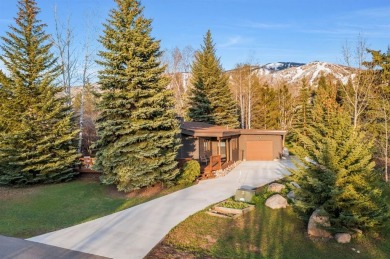Nestled at the end of a tranquil cul-de-sac in a highly on Rollingstone Ranch Golf Club in Colorado - for sale on GolfHomes.com, golf home, golf lot
