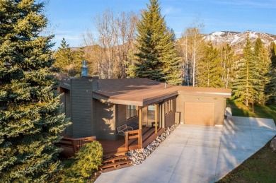 Nestled at the end of a tranquil cul-de-sac in a highly on Rollingstone Ranch Golf Club in Colorado - for sale on GolfHomes.com, golf home, golf lot