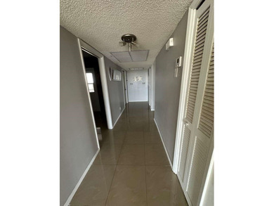 ELEGANT 3 BEDROOM 2 BATH; CONDO IN THE PALM AIRE COUNTRY CLUB on Palm-Aire Country Club and Resort - Palms in Florida - for sale on GolfHomes.com, golf home, golf lot