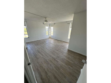 ELEGANT 3 BEDROOM 2 BATH; CONDO IN THE PALM AIRE COUNTRY CLUB on Palm-Aire Country Club and Resort - Palms in Florida - for sale on GolfHomes.com, golf home, golf lot