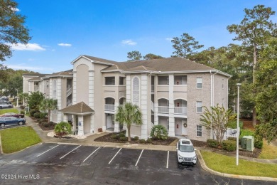 Charming 3 bedroom, 2 bath 1st floor condo nestled in the on Oyster Bay Golf Links in North Carolina - for sale on GolfHomes.com, golf home, golf lot