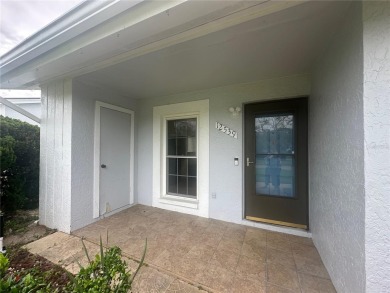 This 55 and over  2 bedroom 2 bath 1129 sq ft condo is located on Beacon Woods Golf Club in Florida - for sale on GolfHomes.com, golf home, golf lot