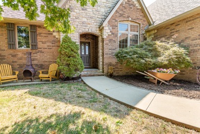 Aggressively priced two-story brick and stone home located in on Rivercut Golf Course in Missouri - for sale on GolfHomes.com, golf home, golf lot