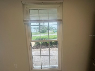 This 55 and over  2 bedroom 2 bath 1129 sq ft condo is located on Beacon Woods Golf Club in Florida - for sale on GolfHomes.com, golf home, golf lot