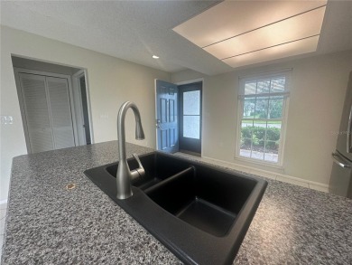 This 55 and over  2 bedroom 2 bath 1129 sq ft condo is located on Beacon Woods Golf Club in Florida - for sale on GolfHomes.com, golf home, golf lot