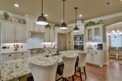 Spectacular custom home nestled on a quiet cul-de-sac with on Pecan Plantation Country Club in Texas - for sale on GolfHomes.com, golf home, golf lot