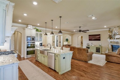 Spectacular custom home nestled on a quiet cul-de-sac with on Pecan Plantation Country Club in Texas - for sale on GolfHomes.com, golf home, golf lot