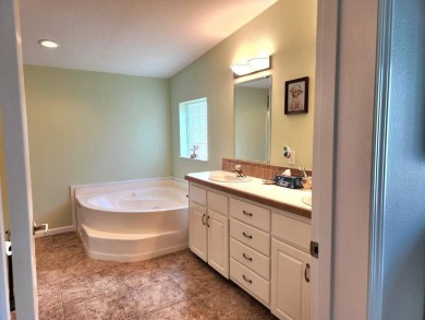 Large triple wide manufactured home located in Tall Oaks, a 55 on TPC At Treviso Bay in Florida - for sale on GolfHomes.com, golf home, golf lot