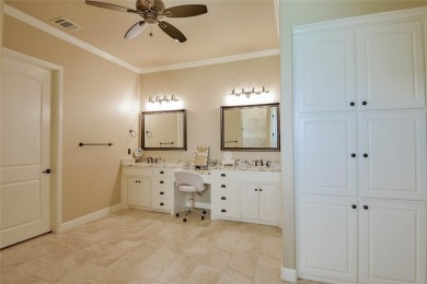 Spectacular custom home nestled on a quiet cul-de-sac with on Pecan Plantation Country Club in Texas - for sale on GolfHomes.com, golf home, golf lot