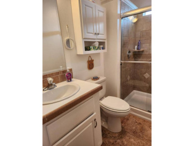 Large triple wide manufactured home located in Tall Oaks, a 55 on TPC At Treviso Bay in Florida - for sale on GolfHomes.com, golf home, golf lot