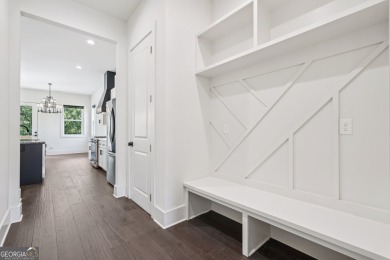 Step into this light-filled 2022-built, 3-bedroom, 2.5-bath on Achasta Golf Club in Georgia - for sale on GolfHomes.com, golf home, golf lot