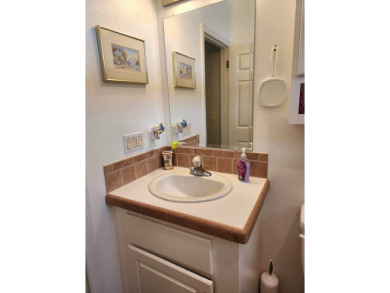 Large triple wide manufactured home located in Tall Oaks, a 55 on TPC At Treviso Bay in Florida - for sale on GolfHomes.com, golf home, golf lot