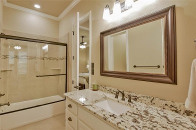 Spectacular custom home nestled on a quiet cul-de-sac with on Pecan Plantation Country Club in Texas - for sale on GolfHomes.com, golf home, golf lot