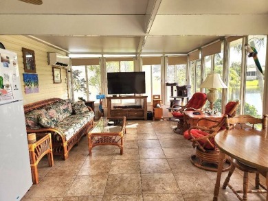Large triple wide manufactured home located in Tall Oaks, a 55 on TPC At Treviso Bay in Florida - for sale on GolfHomes.com, golf home, golf lot
