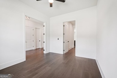 Step into this light-filled 2022-built, 3-bedroom, 2.5-bath on Achasta Golf Club in Georgia - for sale on GolfHomes.com, golf home, golf lot