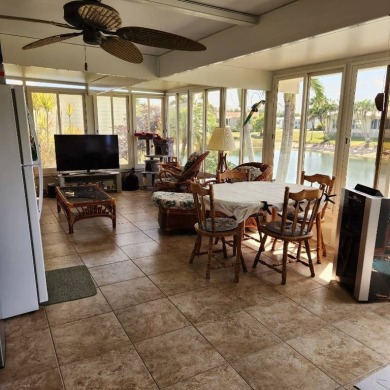 Large triple wide manufactured home located in Tall Oaks, a 55 on TPC At Treviso Bay in Florida - for sale on GolfHomes.com, golf home, golf lot