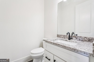 Step into this light-filled 2022-built, 3-bedroom, 2.5-bath on Achasta Golf Club in Georgia - for sale on GolfHomes.com, golf home, golf lot