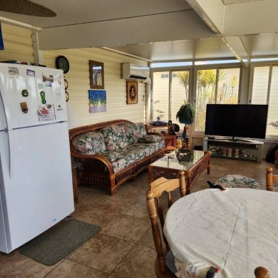 Large triple wide manufactured home located in Tall Oaks, a 55 on TPC At Treviso Bay in Florida - for sale on GolfHomes.com, golf home, golf lot
