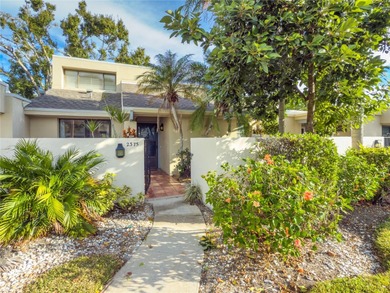 Located just steps from the golf course, this rare and private on The Meadows Golf and Country Club in Florida - for sale on GolfHomes.com, golf home, golf lot