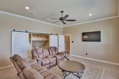 Spectacular custom home nestled on a quiet cul-de-sac with on Pecan Plantation Country Club in Texas - for sale on GolfHomes.com, golf home, golf lot