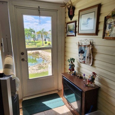 Large triple wide manufactured home located in Tall Oaks, a 55 on TPC At Treviso Bay in Florida - for sale on GolfHomes.com, golf home, golf lot