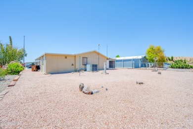 Welcome to this charming 3-bedroom, 2-bathroom home featuring a on 3 Parks Fairways in Arizona - for sale on GolfHomes.com, golf home, golf lot