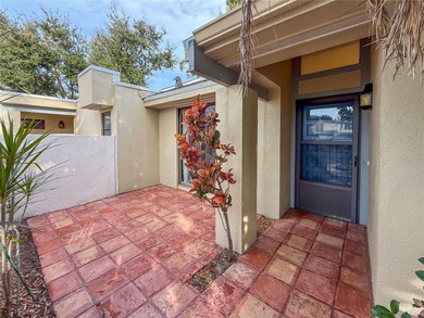 Located just steps from the golf course, this rare and private on The Meadows Golf and Country Club in Florida - for sale on GolfHomes.com, golf home, golf lot