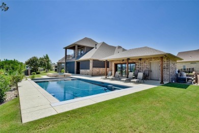 Spectacular custom home nestled on a quiet cul-de-sac with on Pecan Plantation Country Club in Texas - for sale on GolfHomes.com, golf home, golf lot