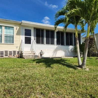 Large triple wide manufactured home located in Tall Oaks, a 55 on TPC At Treviso Bay in Florida - for sale on GolfHomes.com, golf home, golf lot