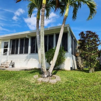 Large triple wide manufactured home located in Tall Oaks, a 55 on TPC At Treviso Bay in Florida - for sale on GolfHomes.com, golf home, golf lot