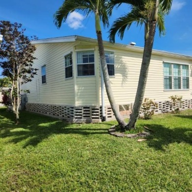 Large triple wide manufactured home located in Tall Oaks, a 55 on TPC At Treviso Bay in Florida - for sale on GolfHomes.com, golf home, golf lot