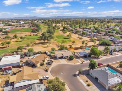 Welcome to this beautifully updated three-bedroom, two-bath home on Paradise Valley Park Golf Course in Arizona - for sale on GolfHomes.com, golf home, golf lot