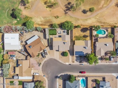 Welcome to this beautifully updated three-bedroom, two-bath home on Paradise Valley Park Golf Course in Arizona - for sale on GolfHomes.com, golf home, golf lot