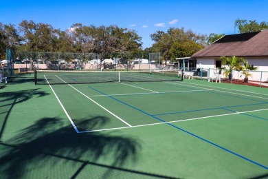 Large triple wide manufactured home located in Tall Oaks, a 55 on TPC At Treviso Bay in Florida - for sale on GolfHomes.com, golf home, golf lot