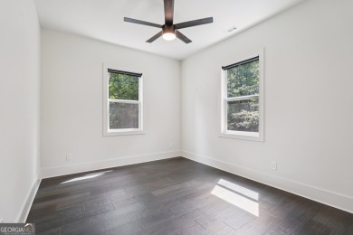 Step into this light-filled 2022-built, 3-bedroom, 2.5-bath on Achasta Golf Club in Georgia - for sale on GolfHomes.com, golf home, golf lot