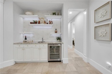 Start your morning with coffee on your peaceful, garden-view on Grey Oaks Golf and Country Club in Florida - for sale on GolfHomes.com, golf home, golf lot