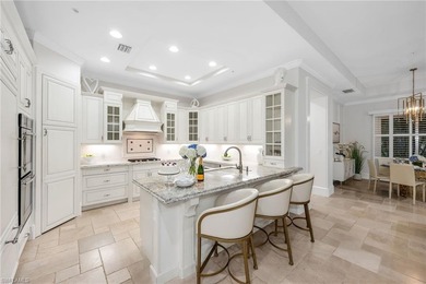 Start your morning with coffee on your peaceful, garden-view on Grey Oaks Golf and Country Club in Florida - for sale on GolfHomes.com, golf home, golf lot