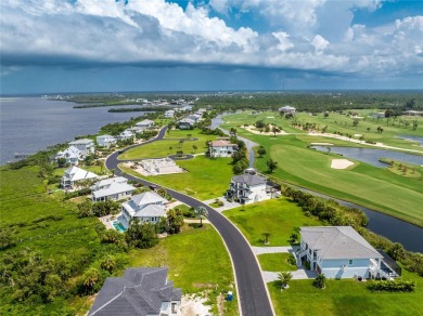 SPECTACULAR GATED COMMUNITY WITH STELLAR VIEWS ALL AROUND! This on Lemon Bay Golf Club in Florida - for sale on GolfHomes.com, golf home, golf lot