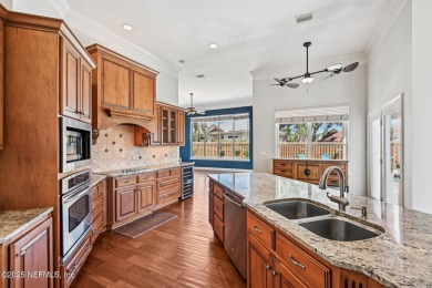 Welcome to this beautifully updated 4-bedroom, 3-bathroom pool on Jacksonville Golf and Country Club in Florida - for sale on GolfHomes.com, golf home, golf lot
