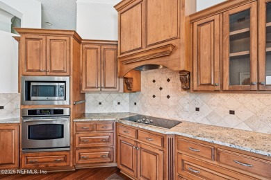 Welcome to this beautifully updated 4-bedroom, 3-bathroom pool on Jacksonville Golf and Country Club in Florida - for sale on GolfHomes.com, golf home, golf lot