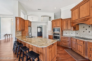 Welcome to this beautifully updated 4-bedroom, 3-bathroom pool on Jacksonville Golf and Country Club in Florida - for sale on GolfHomes.com, golf home, golf lot