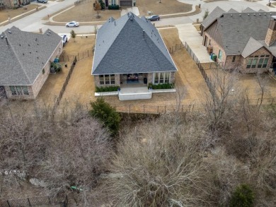 Welcome to your dream home, a charming one-story retreat that on The Bridges Golf Club in Texas - for sale on GolfHomes.com, golf home, golf lot