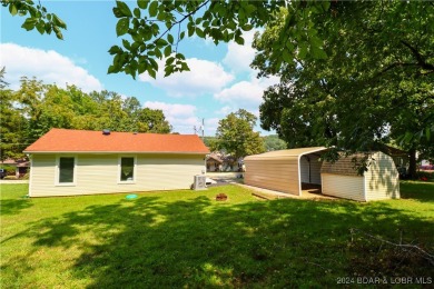 Lake views and peace surround this adorable home. Step into your on Indian Rock Golf Club in Missouri - for sale on GolfHomes.com, golf home, golf lot