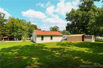 Lake views and peace surround this adorable home. Step into your on Indian Rock Golf Club in Missouri - for sale on GolfHomes.com, golf home, golf lot