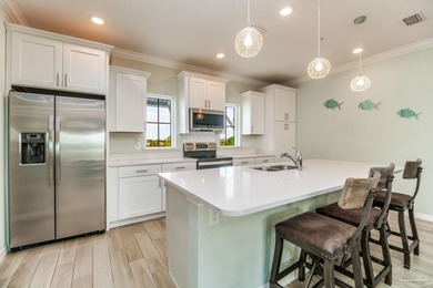 Welcome to your slice of coastal luxury in Lost Key Beach and on Lost Key Golf Club in Florida - for sale on GolfHomes.com, golf home, golf lot