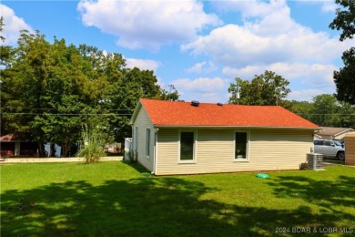 Lake views and peace surround this adorable home. Step into your on Indian Rock Golf Club in Missouri - for sale on GolfHomes.com, golf home, golf lot