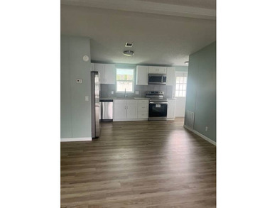 Don't miss your chance to own this beautifully renovated home in on Hamptons Golf Club in Florida - for sale on GolfHomes.com, golf home, golf lot