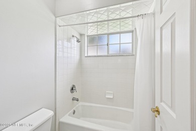 Welcome to this beautifully updated 4-bedroom, 3-bathroom pool on Jacksonville Golf and Country Club in Florida - for sale on GolfHomes.com, golf home, golf lot