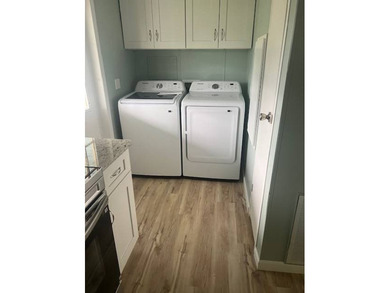 Don't miss your chance to own this beautifully renovated home in on Hamptons Golf Club in Florida - for sale on GolfHomes.com, golf home, golf lot